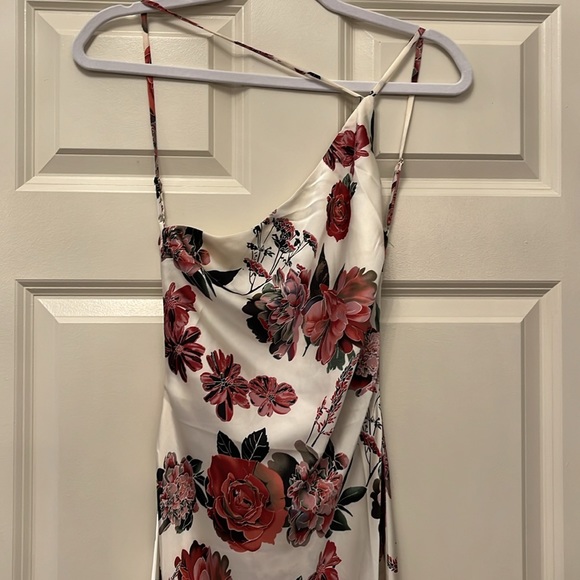 NWOT! Gorgeous silky asymmetrical dress. Has a draped scoop back. - Picture 5 of 11